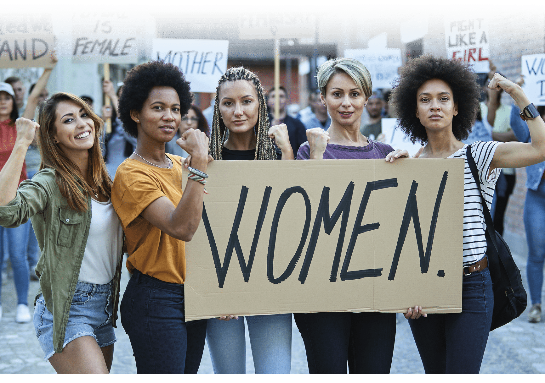 Multi-ethnic group of females flexing their biceps while participating in a protests for women's rights.