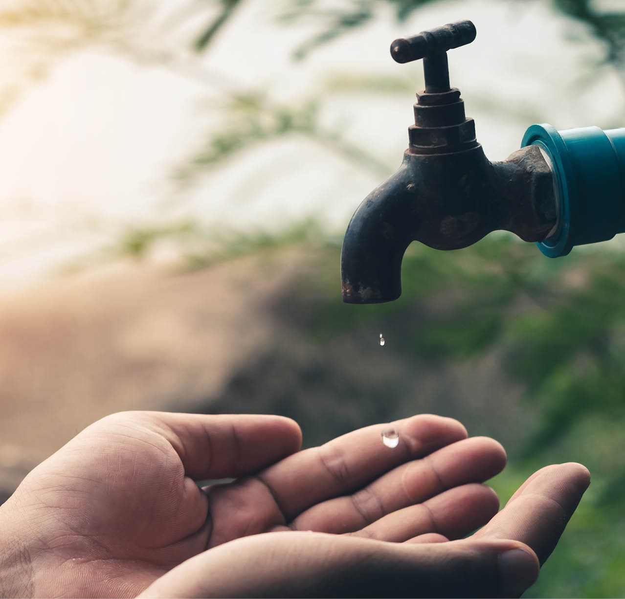 Men hand are waiting to drink water in the water shortage.