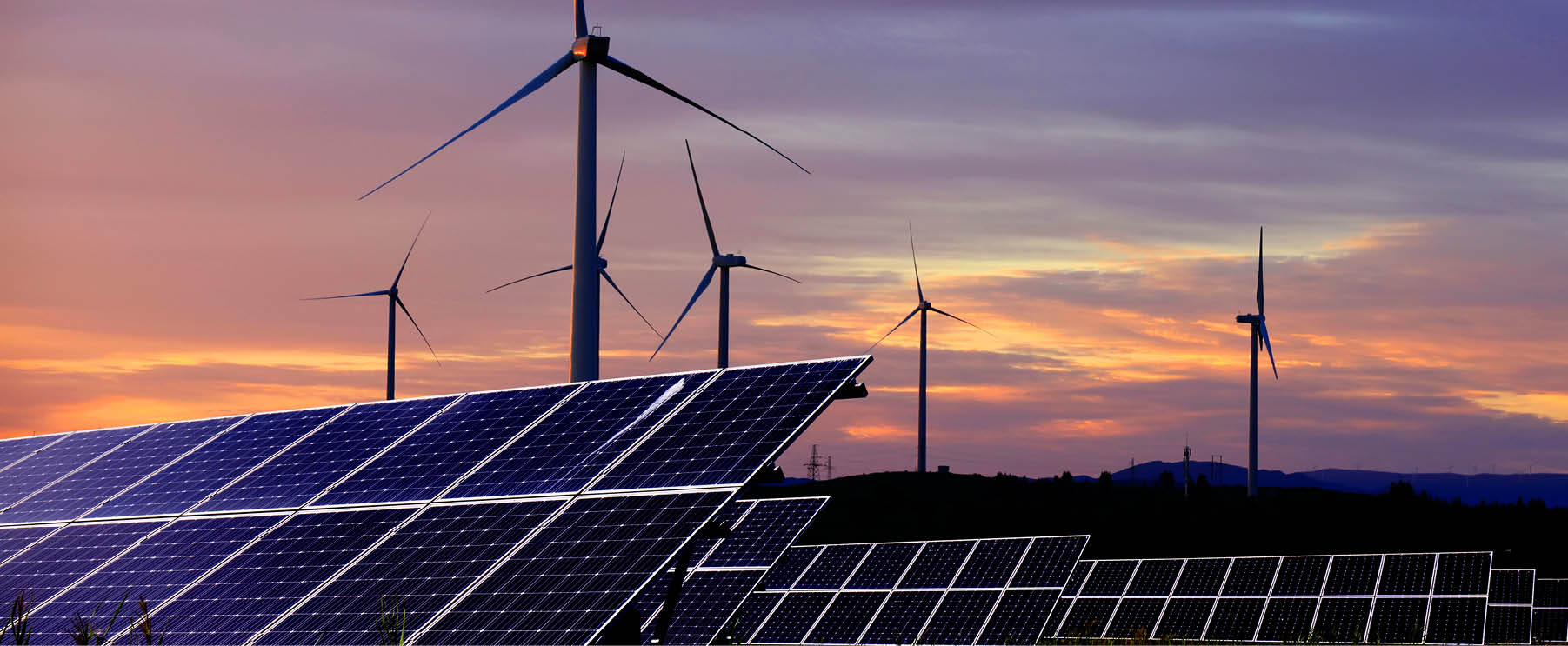 Solar photovoltaic panels and wind turbines. Energy concept