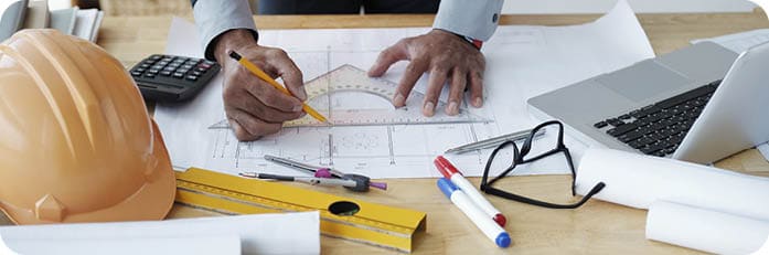 Cropped image of engineer drawing construction plan